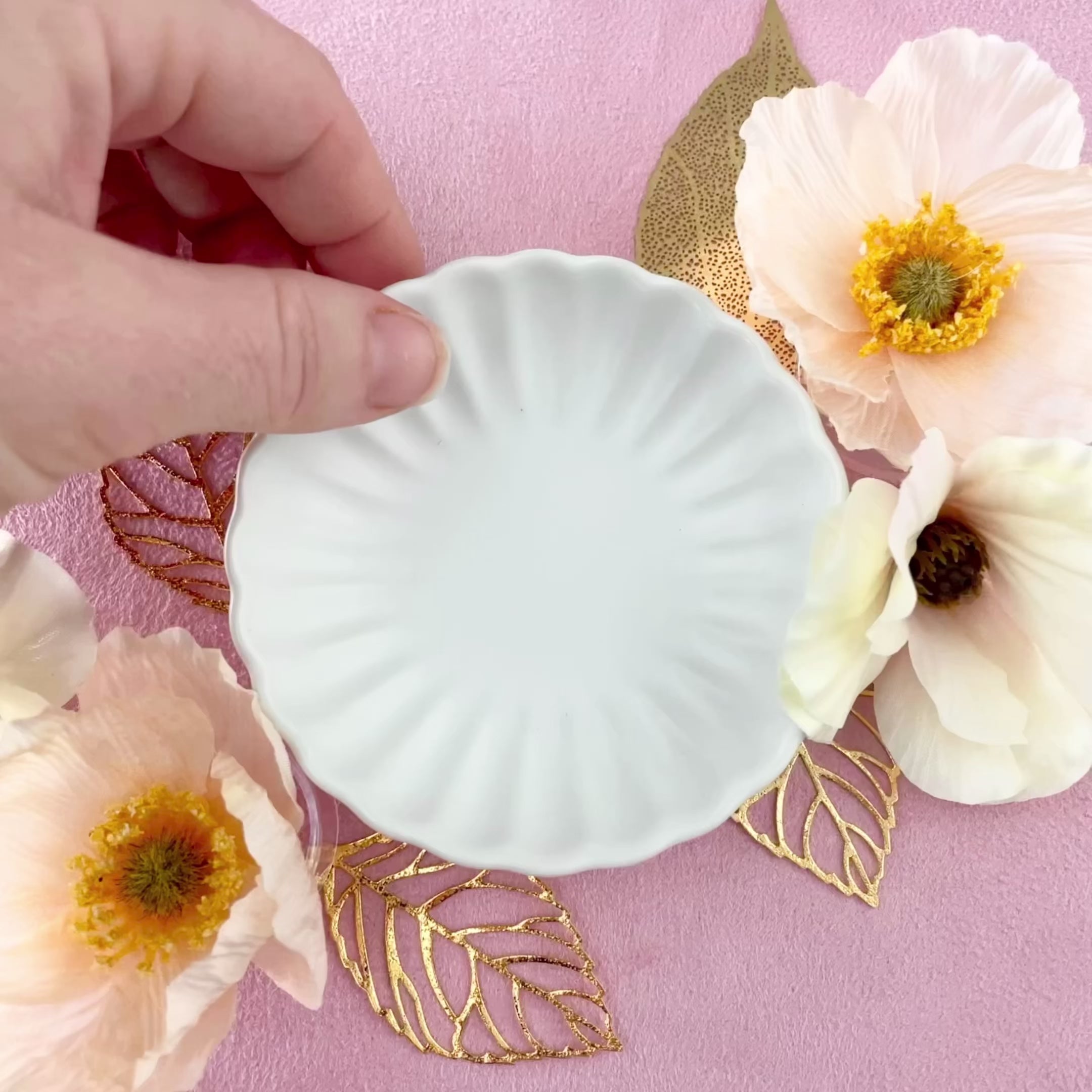 Video close up of Matte white scalloped dish - wedding flat lay props from Champagne & GRIT