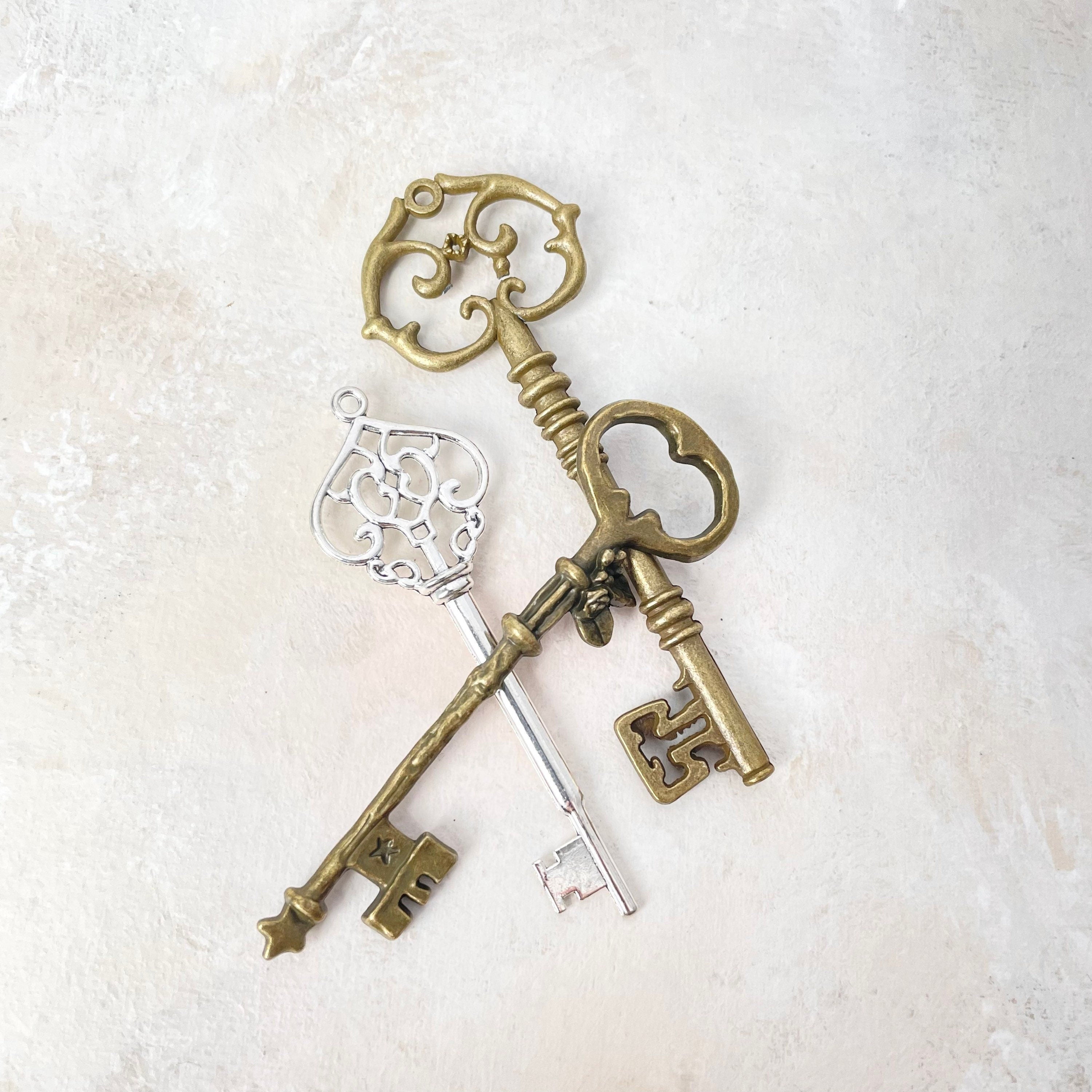 3 keys, gold, bronze and silver - must have Wedding Flat lay props from Champagne & GRIT