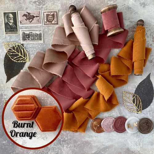 Burnt orange ring box, 4 vintage stamps, 5 wax seals, 5 metal styling leaves, 3 spools of ribbon - Wedding Flat lay props from Champagne & GRIT