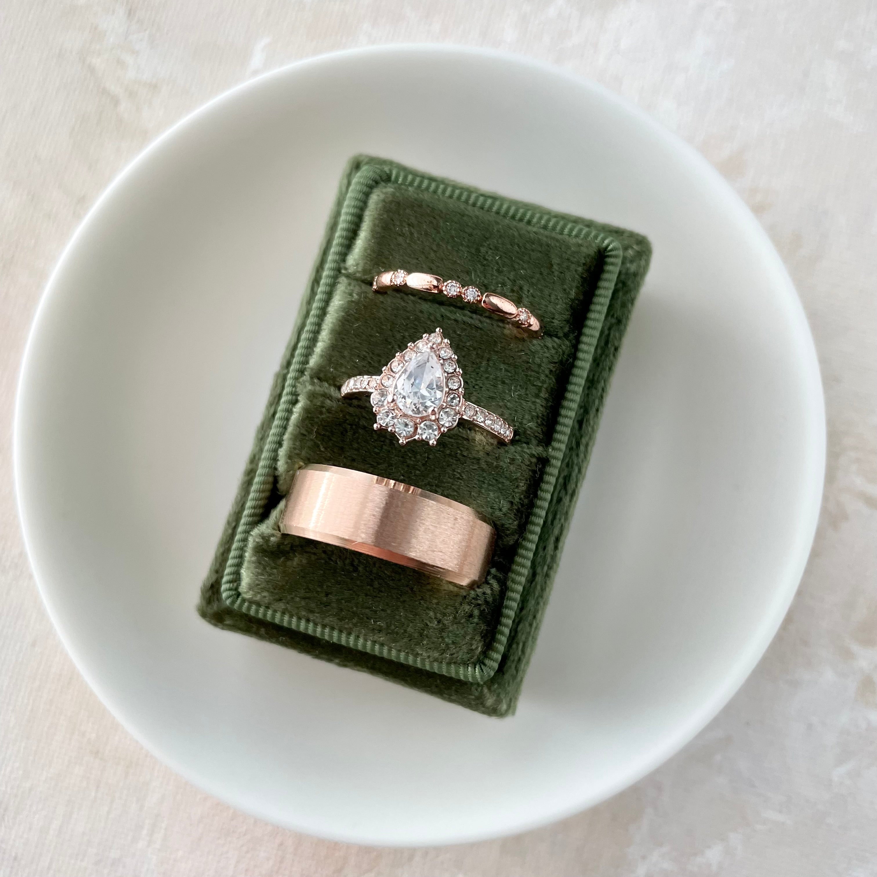 Olive Green tripe slot ring box on white dish - Wedding Flat lay props from Champagne & GRIT