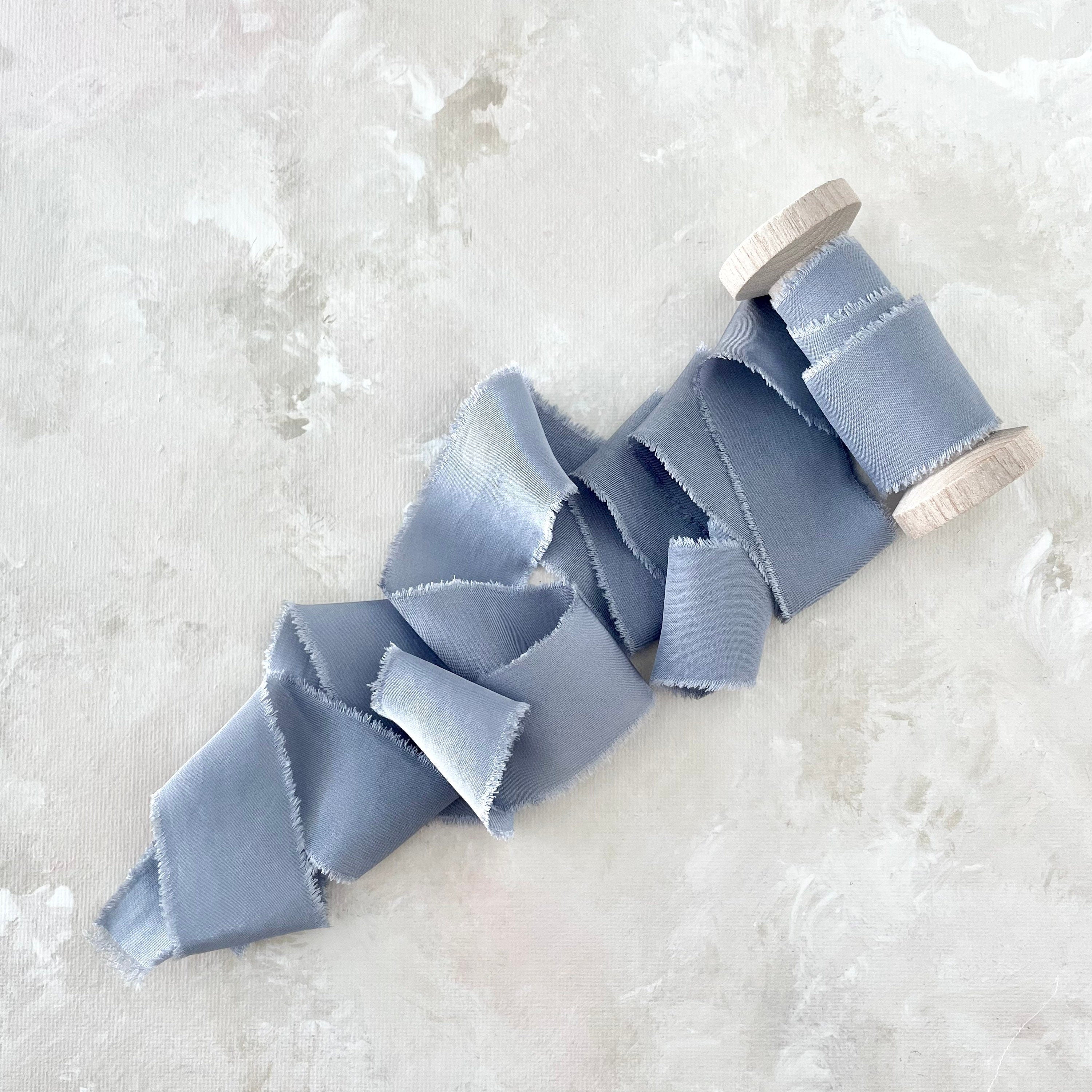 Dusty Blue Ribbon - wedding flat lay props from Champagne & GRIT