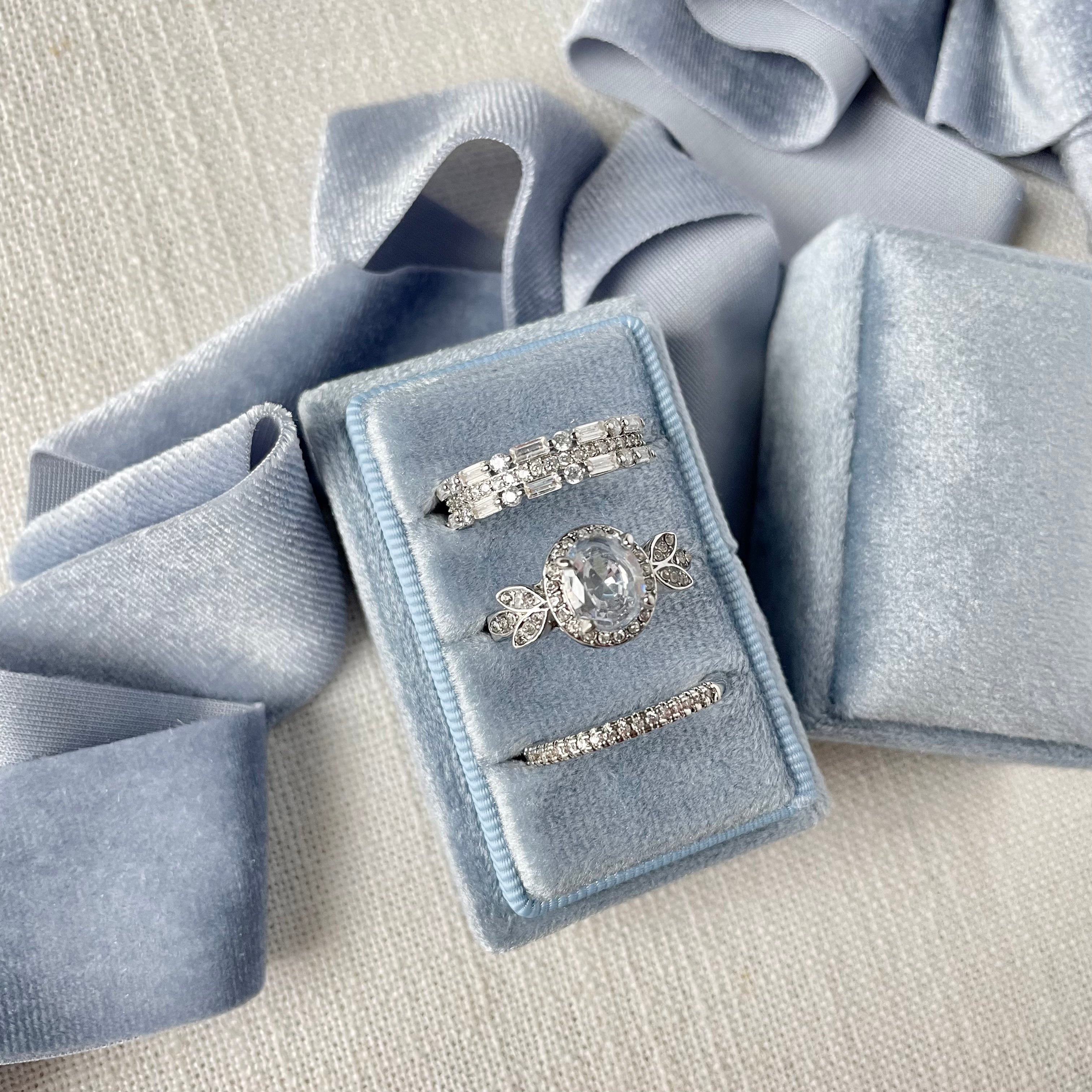 Dusty Blue 3 slot ring box styled with dusty blue ribbon  - Wedding Flat lay props from Champagne & GRIT