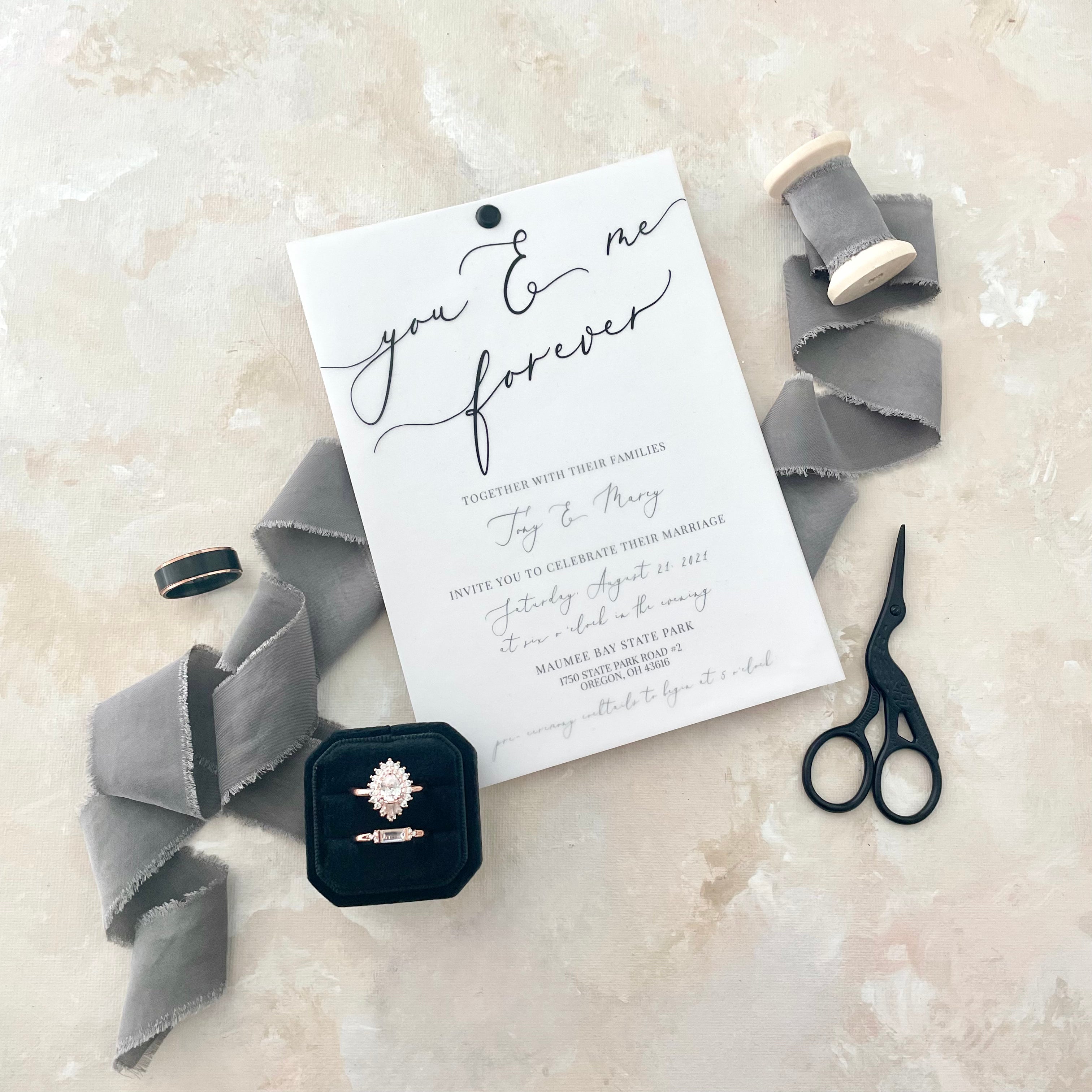 Modern black scissors styled with wedding invitation, black ring box and gray ribbon - Wedding Flat lay props from Champagne & GRIT