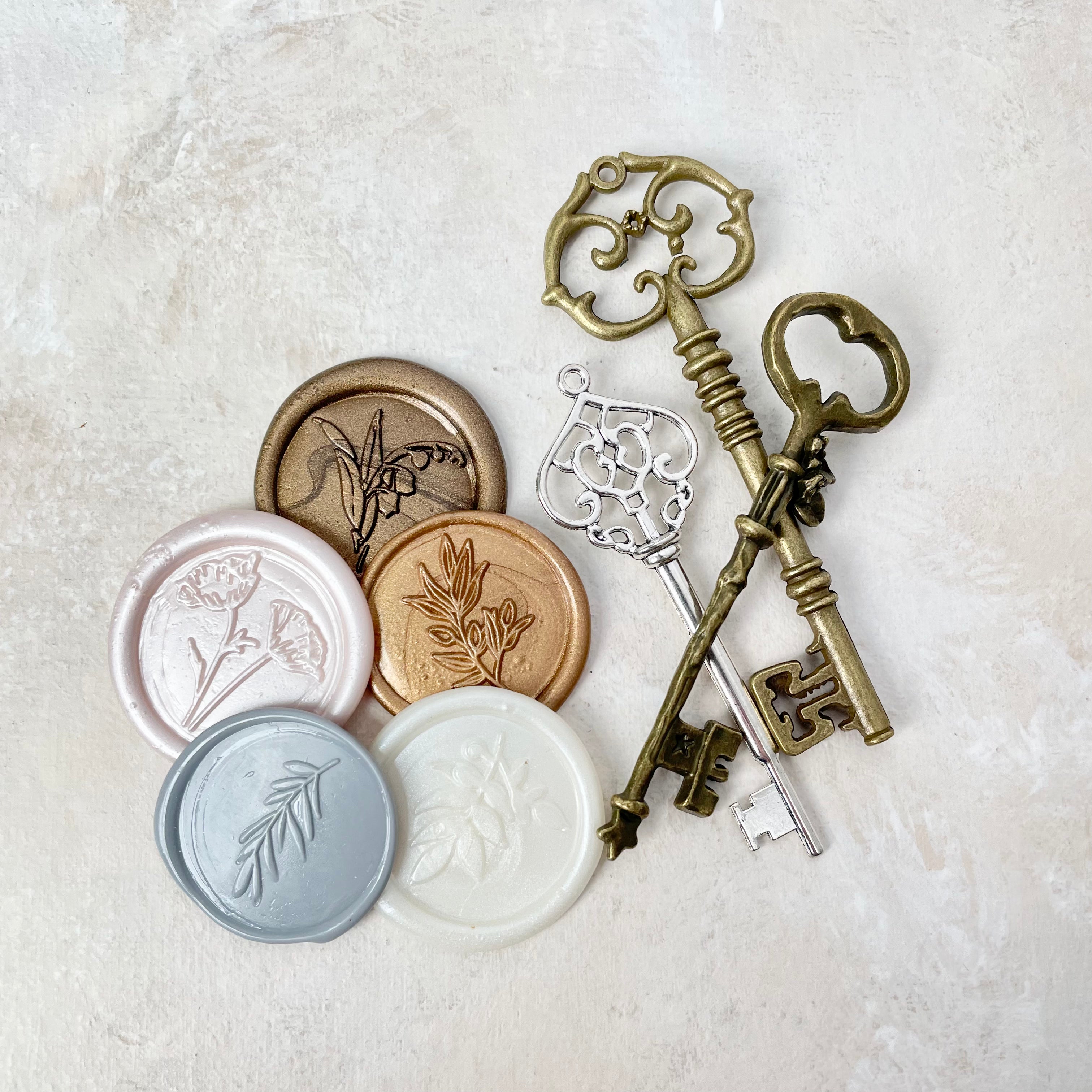 5 Classic neutral color pallet Wax Seals styled beside three vintage keys - flat lay props from Champagne & GRIT