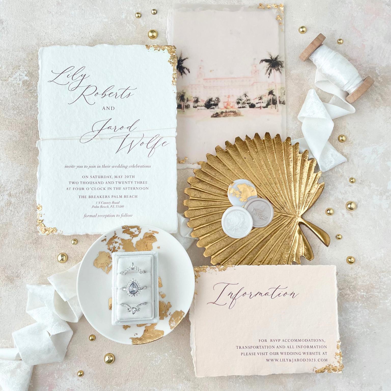 Wedding Flat Lay invitation Suite, in white & gold, featuring a gold dish & white ribbon & ring box