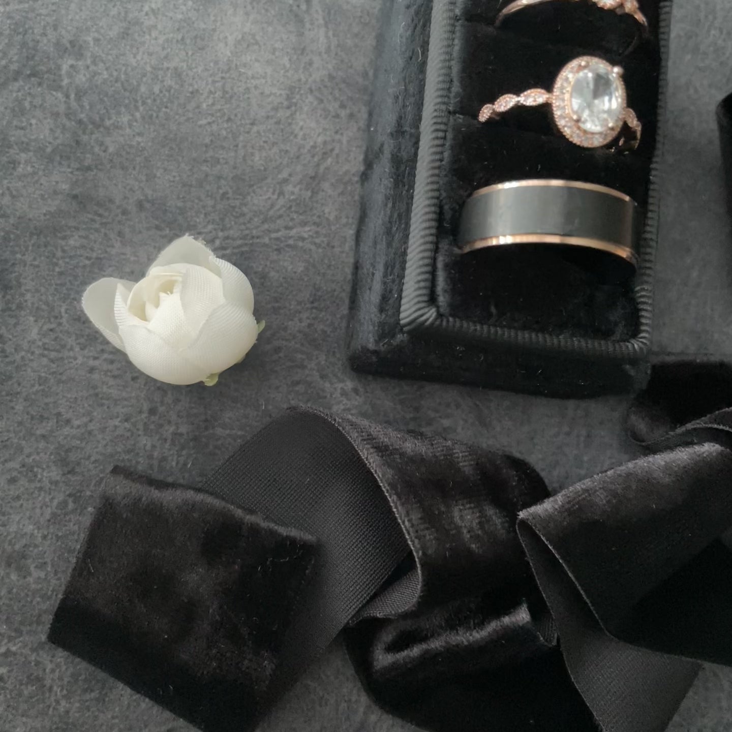 Video of Black triple ring box styled with black flat lay ribbon  - Flat Lay Props from Champagne & GRIT
