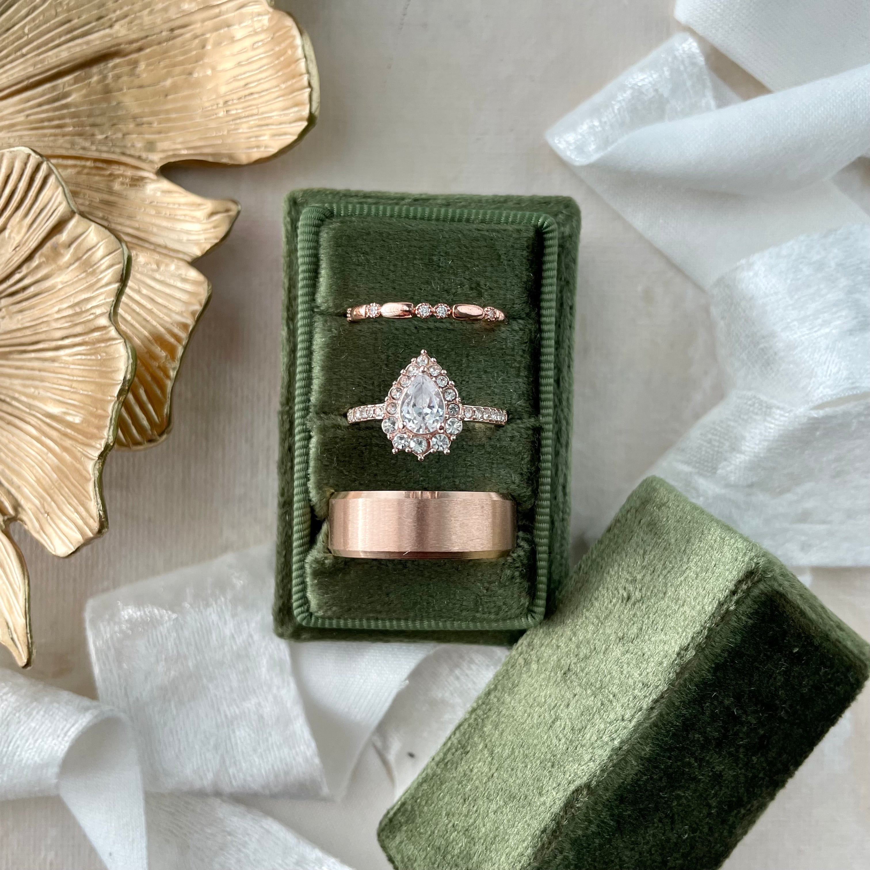 Olive Green tripe slot ring box styled with white ribbon and gold leaf dish - Wedding Flat lay props from Champagne & GRIT
