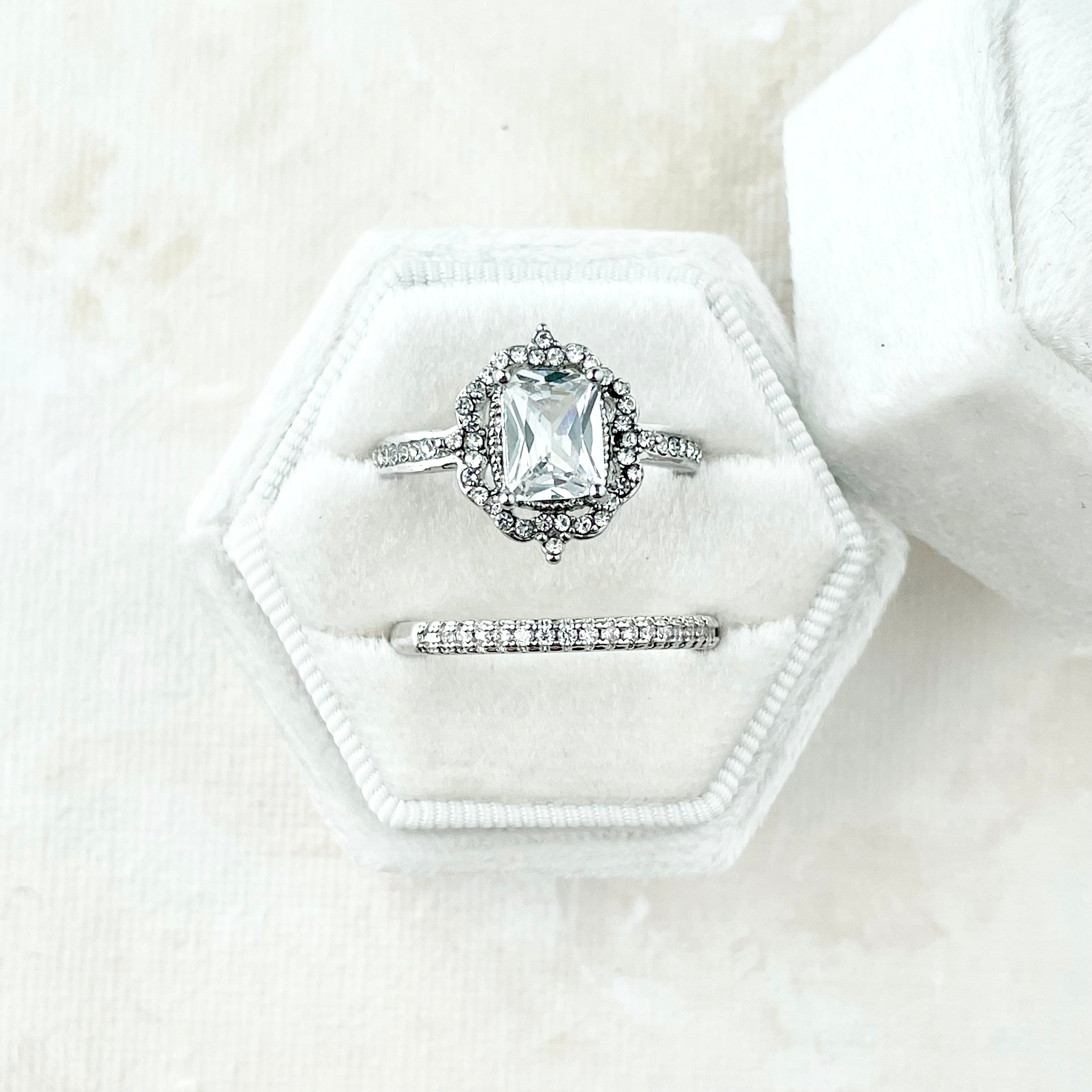 Close up of hexagon white ring box- Wedding Flat lay props from Champagne & GRIT