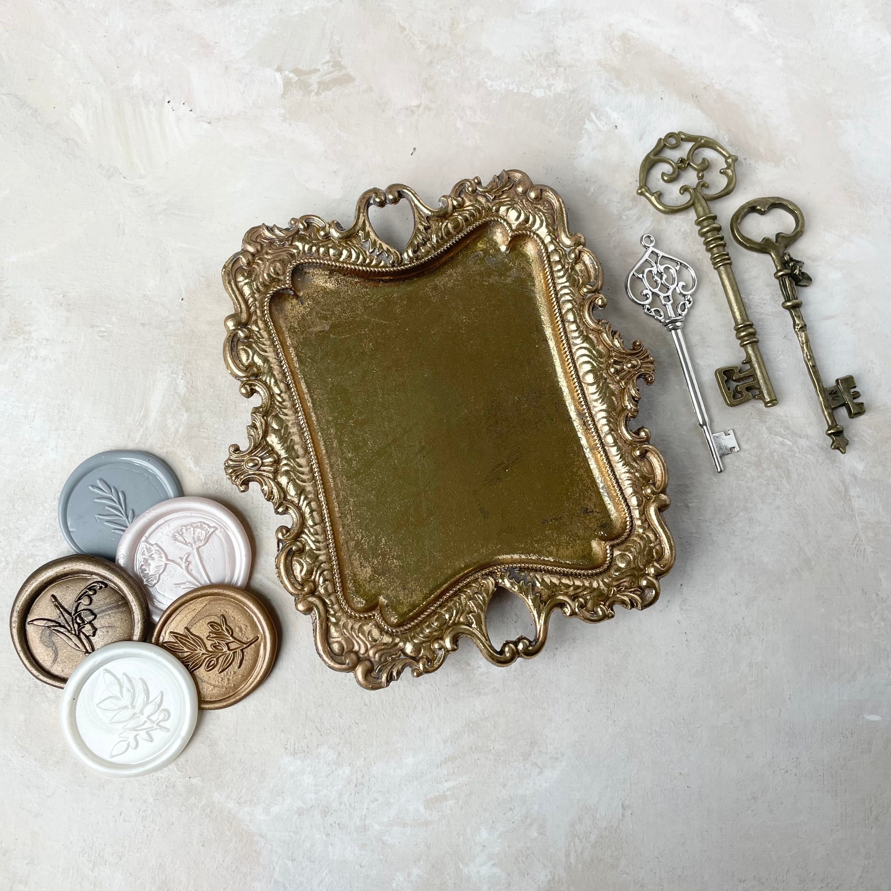 Styling Keys and Classic wax seals beside gold vintage tray - Wedding Flat lay props from Champagne & GRIT