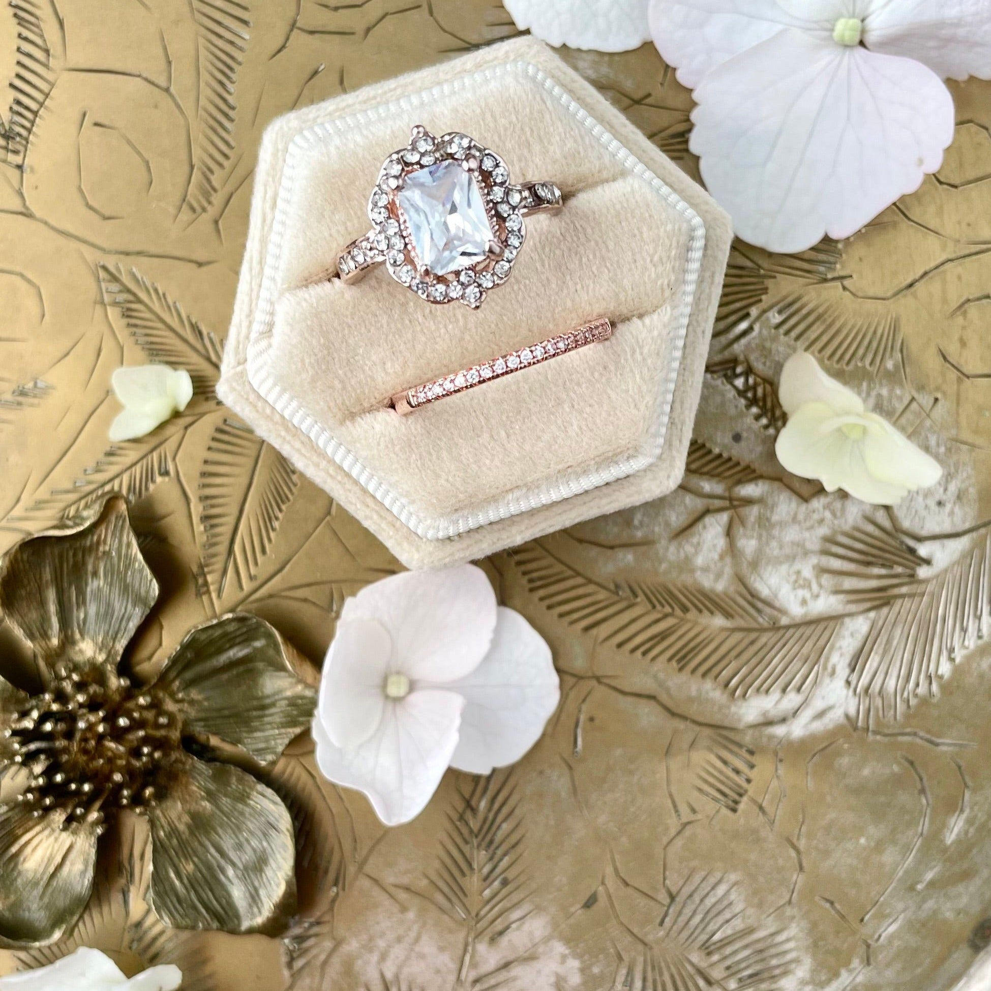 Tan velvet ring box with white florals and one metal styling flower - Flat lay props from Champagne & GRIT