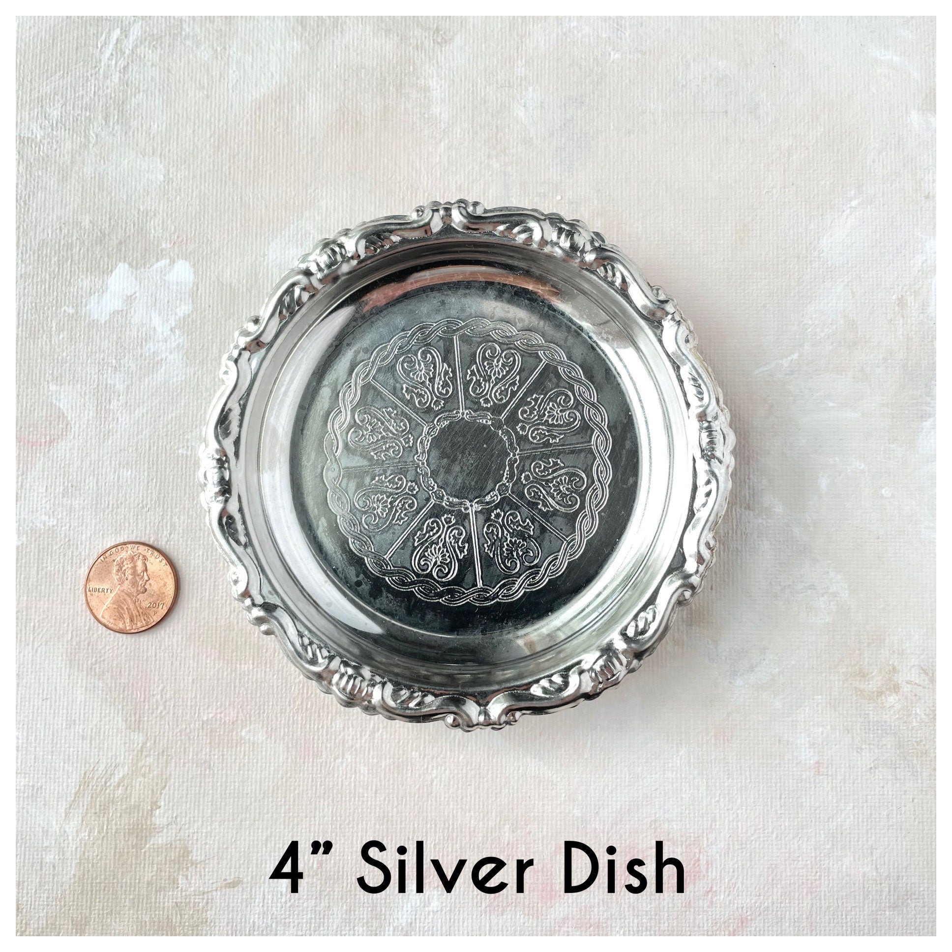 4 inch Silver round dish with penny beside for size reference - Flat lay props from Champagne & GRIT