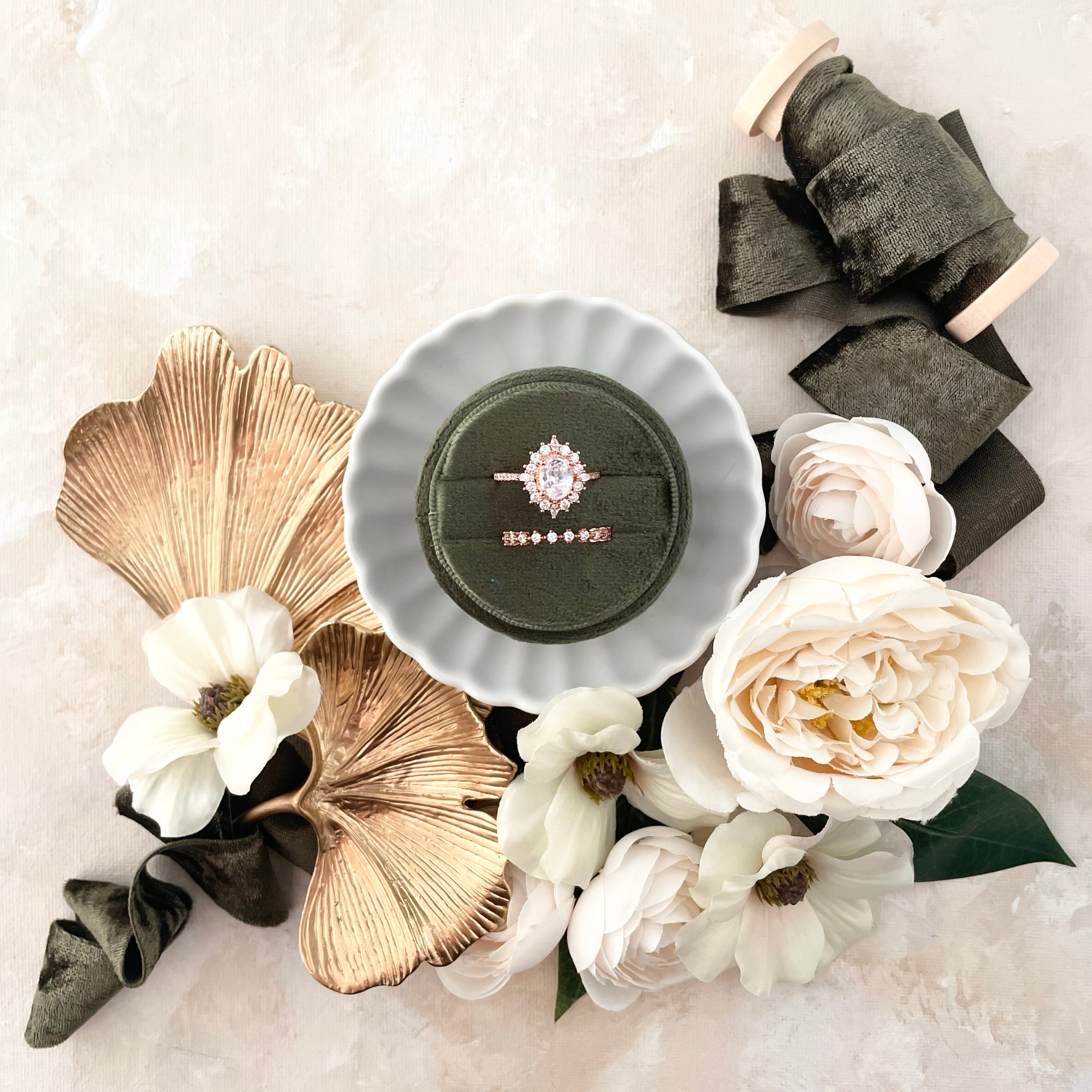 Ginkgo Leaf Gold Styling Tray styled with olive green ring box in a white tray, olive green ribbon, and ivory florals - Flat Lay Props from Champagne & GRIT