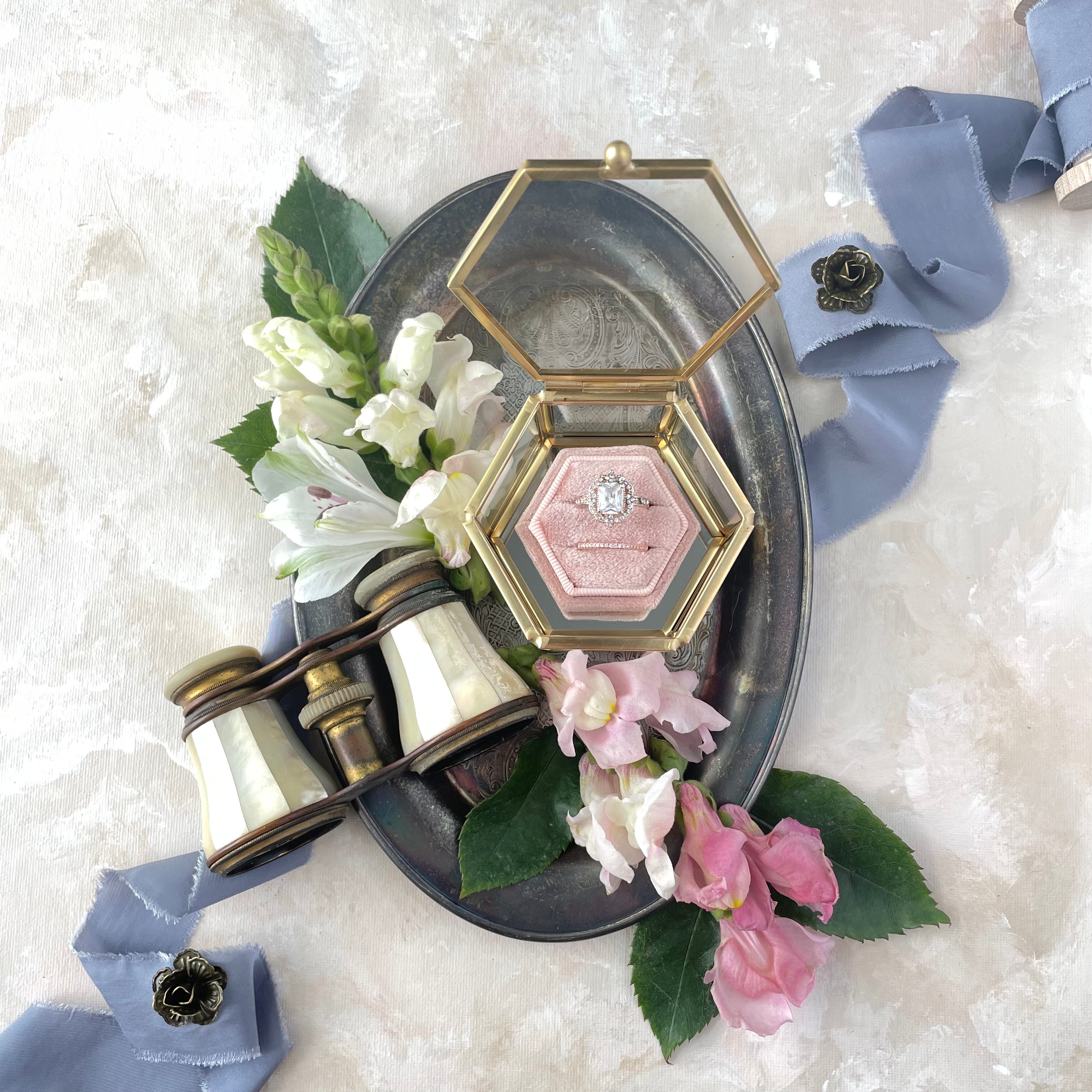 Dusty Blue Ribbon, styled with dusty pink ring box and vintage opera glasses and florals - wedding flat lay props from Champagne & GRIT