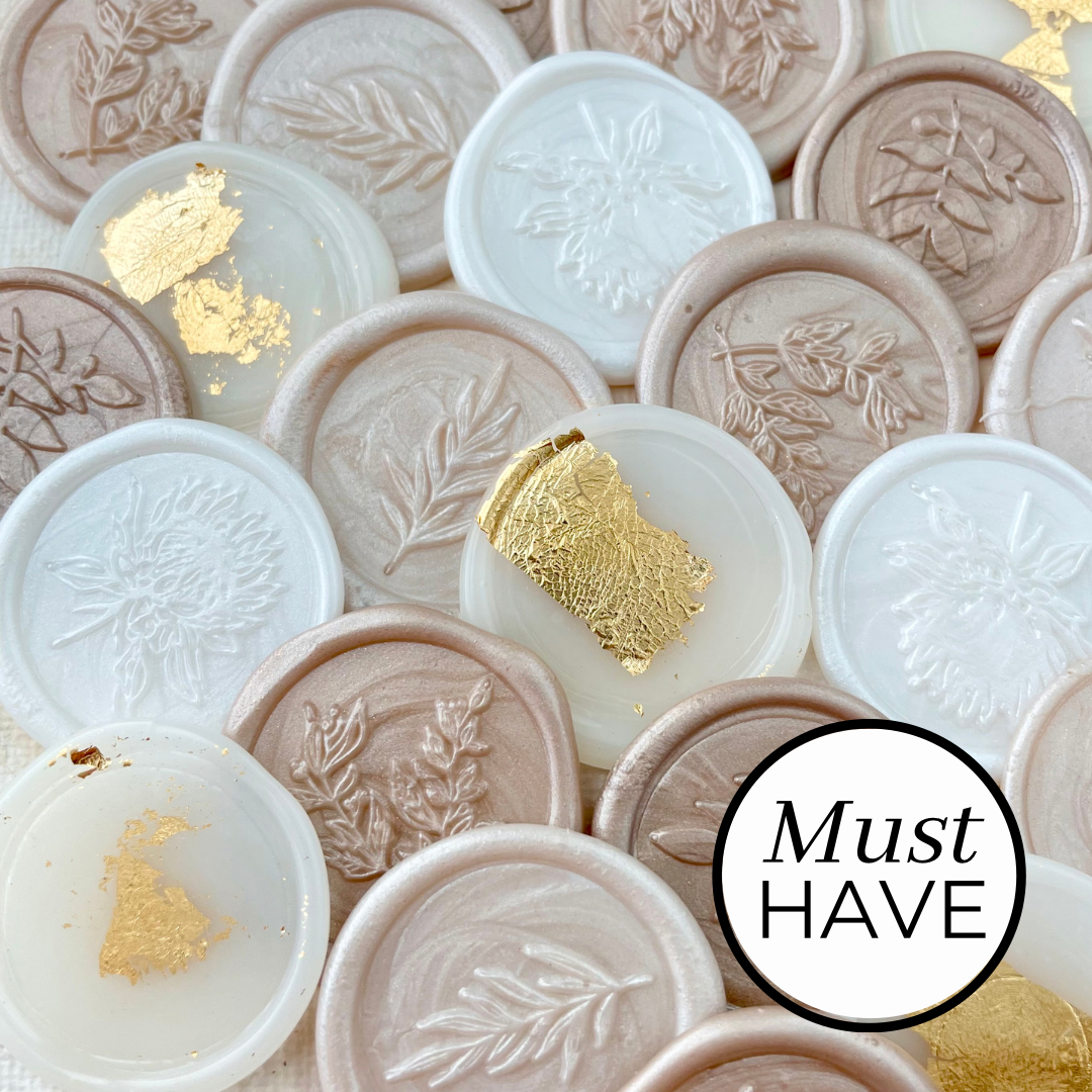 Collection of champagne wax seals must have flat lay props from Champagne & GRIT