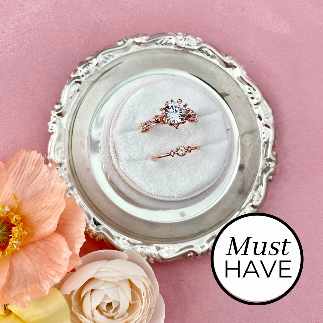 Small vintage silver ring dish with white ring box and florals on pink styling mat - Wedding Flat lay props from Champagne & GRIT