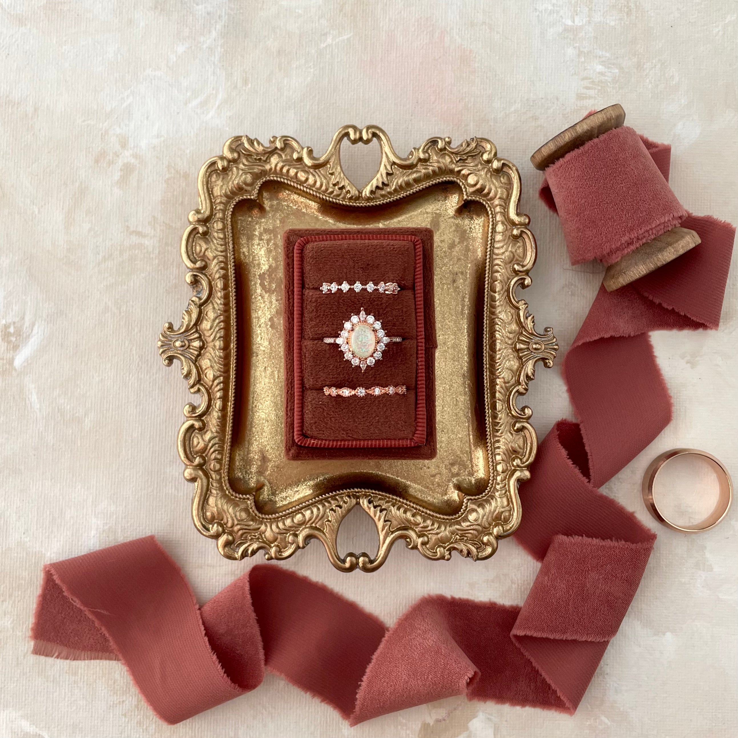 Terracotta Ring Box, 3 slot ring box on vintage gold tray styled with Terracotta ribbon and gold wedding ring - Flat Lay Props from Champagne & GRIT