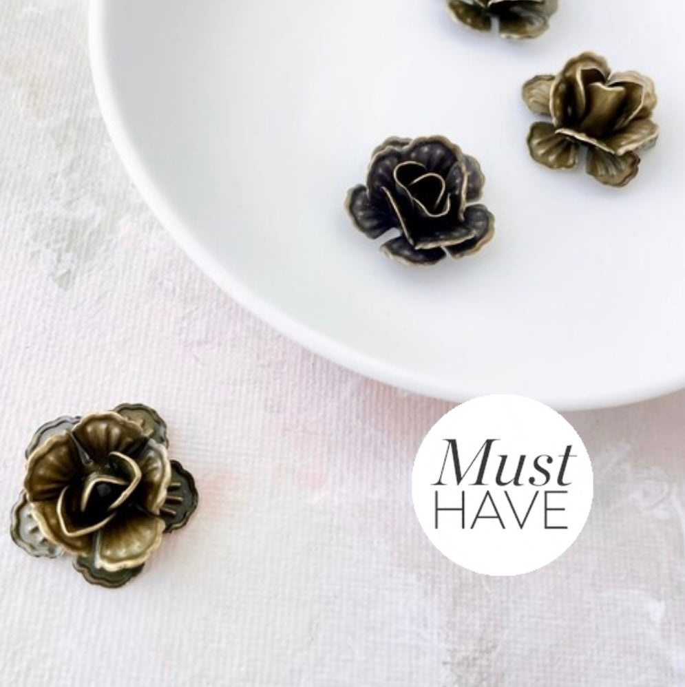 Mini bronze styling flowers and white dish, must have flat lay props from Champagne & GRIT